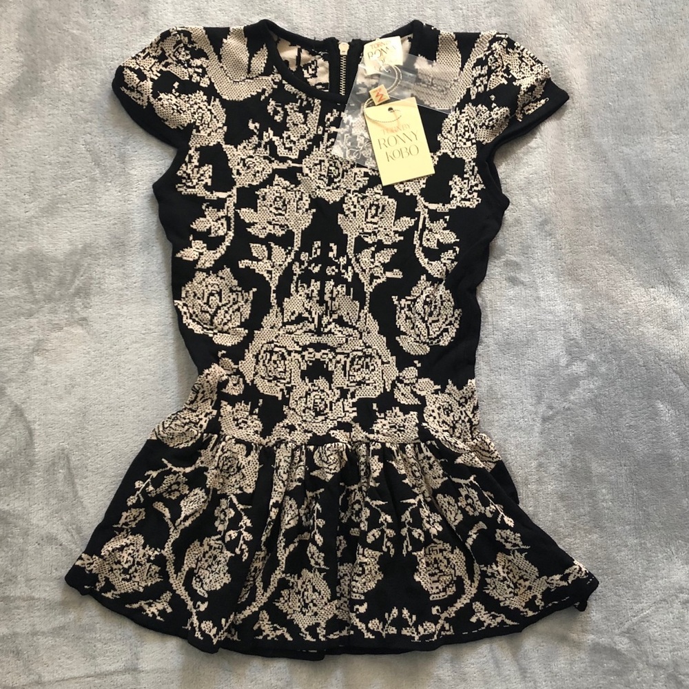 Torn by Ronny Kobo peplum top